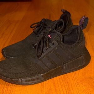 Women’s black Adidas NMD